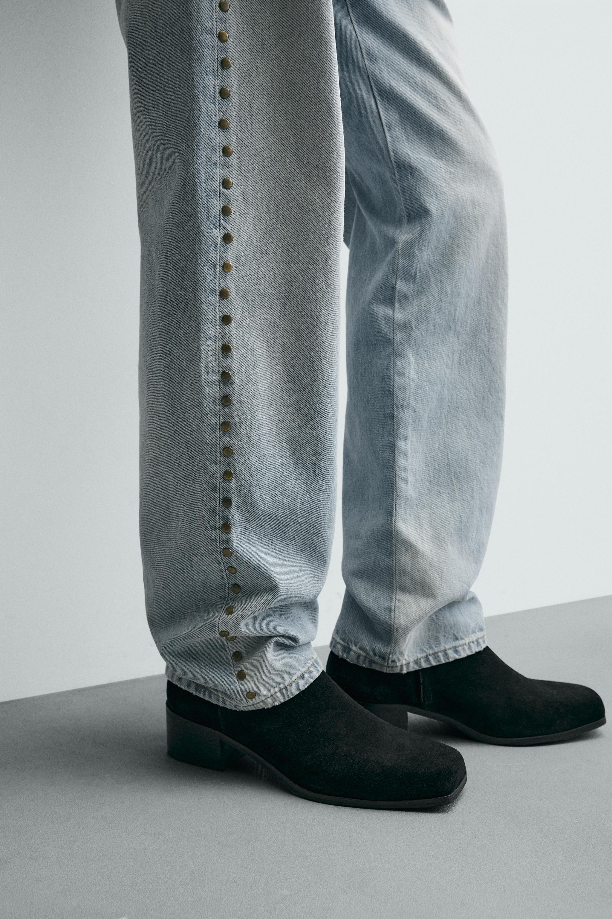 JEAN STRAIGHT FIT CLOUS MÉTALLIQUES